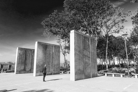 NEW YORK CITY - SEPTEMBER 2015: Tourists visit WW2 Memorial in lower Manhattan. The city attracts 50 million people annually.のeditorial素材