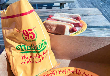 NEW YORK CITY, USA - OCTOBER 2015 : Customers at the original Nathan's Famous hot dogs stand in Coney Island.のeditorial素材