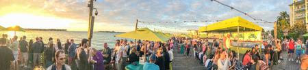KEY WEST, FL - FEBRUARY 2016: Tourists awaits sunset in Mallory Square, panoramic view. Key West is a major tourist destination in Florida.のeditorial素材