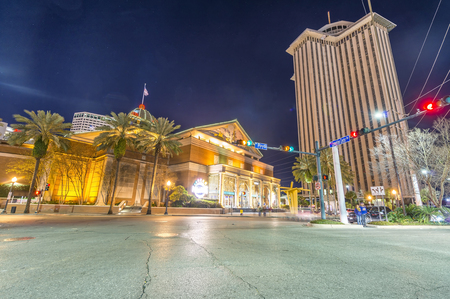 NEW ORLEANS, USA - FEBRUARY 2016: Tourists along city streets at night. New Orleans attracts 10 million tourists annually.のeditorial素材