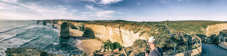 Tourists at Twelve Apostles lookout. This is a major attraction in Australia.の写真素材