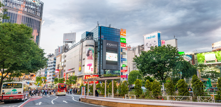 TOKYO - JUNE 1, 2016: Panoramic view of Shibuya street and traffic at sunset. Shibuya is a popular district of Tokyo.のeditorial素材