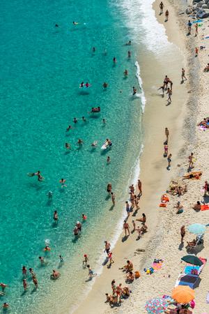 Overhead view of people at the beach, holiday concept.のeditorial素材