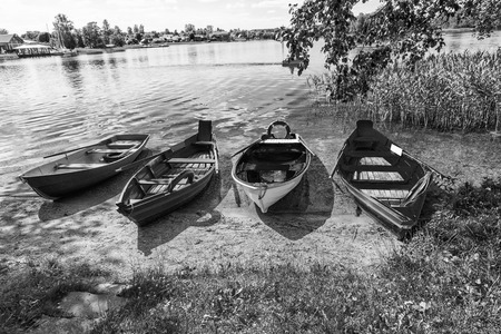 Colorful boats on lake shore.の写真素材
