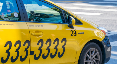 SAN FRANCISCO - AUGUST 2017: Yellow cab telephone number sign in San Francisco. This is the best way to move in the city.のeditorial素材