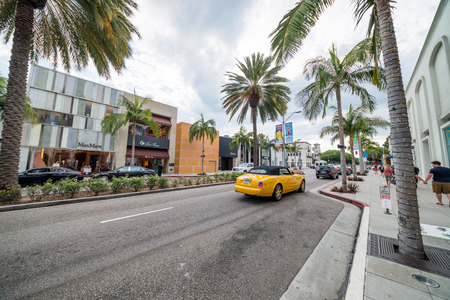BEVERLY HILLS, CA - Rodeo Drive with tourists. Beverly Hills is a famous tourist attraction.のeditorial素材