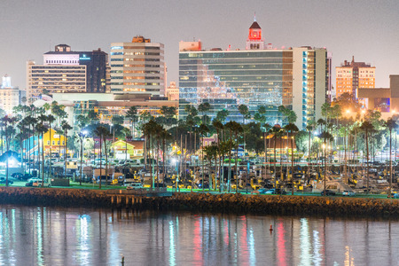 LONG BEACH, CA - JULY 31, 2017: Sunset skyline from Queen Mary. Long Beach is a city in southern Los Angeles County.のeditorial素材