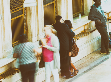 NEW YORK CITY - JUNE 2013: People move along the Interior of the main concourse at historic Grand Central Terminal.のeditorial素材