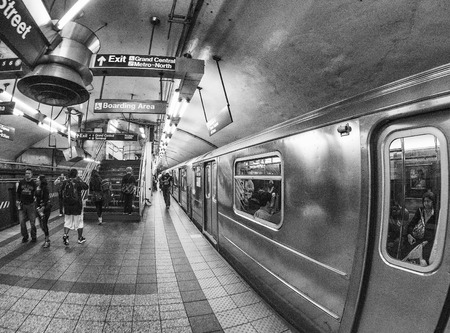 NEW YORK CITY - JUNE 2013: Interior of Manhattan subway. This the most efficient way to move across the city.のeditorial素材