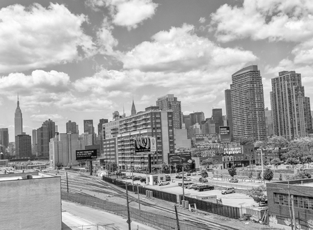 NEW YORK CITY - JUNE 9, 2013: Aerial view of Midtown skyscrapers. New York attracts 50 million tourists every year.のeditorial素材