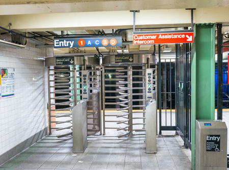 NEW YORK CITY - JUNE 13, 2013: Tourists inside subway station. New York attracts 50 million people...