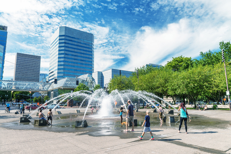 PORTLAND, OR - AUGUST 18, 2017: Tourists visit city center. Portland attacts 3 million people annually.のeditorial素材