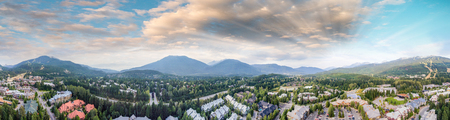 Panoramic aerial view of Whistler skyline and surrounding mountain scenario in summer.