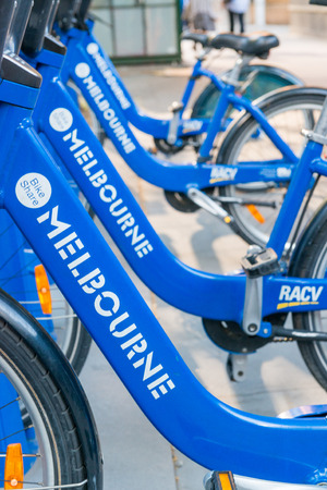MELBOURNE - OCTOBER 2015: Row of Melbourne share bikes. Bike renting system is created to provide people with an additional transportation option.のeditorial素材