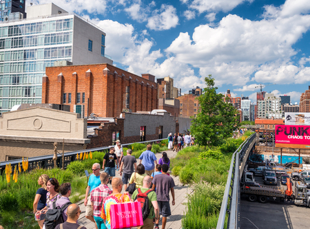 NEW YORK CITY - JUNE 2013: People move along High Line city park. It is a famous city attraction.のeditorial素材