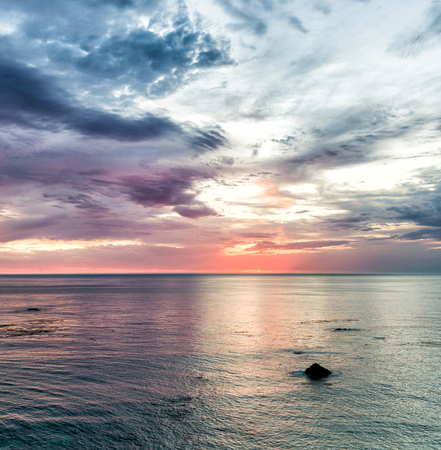 Beautiful sunset colors over the ocean.の写真素材