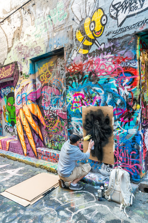 MELBOURNE, AUSTRALIA, - OCTOBER 2015: Colorful street art by unidentified artist in Melbourne laneway.のeditorial素材