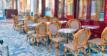 PARIS, FRANCE - DECEMBER 2012: Tourists visit Montmartre art district. The city attracts 40 million people every year.のeditorial素材
