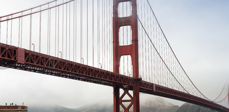 San Francisco Golden Gate Bridge on a foggy day from Fort Point.の写真素材