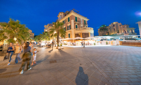 LIDO DI OSTIA, ITALY - JULY 26, 2017: Tourist along city streets. The city is a famous tourist attraction in summer.のeditorial素材