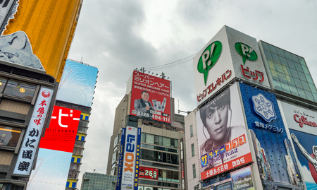 OSAKA, JAPAN - MAY 2016: Dotonbori district with buildings and ads. This is a famous city attraction for tourists.のeditorial素材