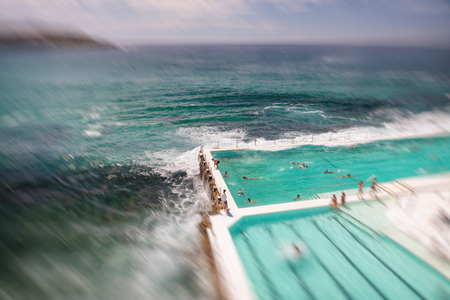 SYDNEY - OCTOBER 2015: People enjoy Bondi Beach pools. Sydney attracts 15 million people annually.のeditorial素材