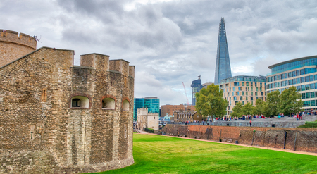 The Tower of London and modern skyline on background, UK.のeditorial素材