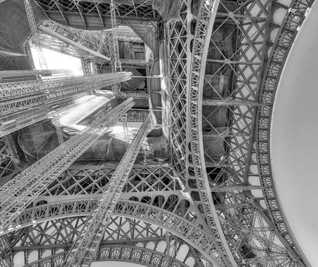 Upward view of Eiffel Tower on a beautiful sunny winter day - Paris - France.