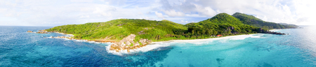 Panoramic aerial view of beautiful tropical Island at sunset.