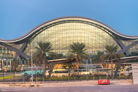 DOHA, QUATAR - DECEMBER 3, 2016: Exterior of international airport at sunrise. This is a major hube for eastern travels.のeditorial素材