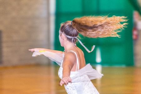 Skater girl dancing on the dance floor.の写真素材