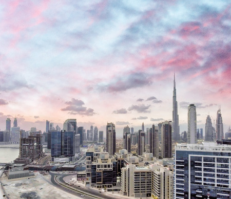 Downtown Dubai at sunset from city river, aerial view.のeditorial素材