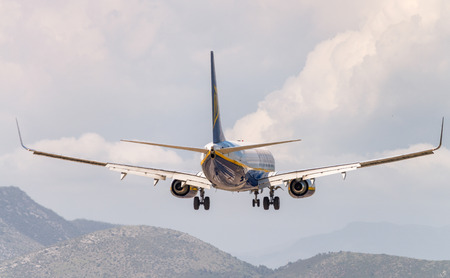PISA, ITALY - JUN 1: Ryanair airplane lands in the main Tuscany airport, June 1, 2013 in Pisa, Italy. Ryanair is the major airplane low cost company in Europe.のeditorial素材