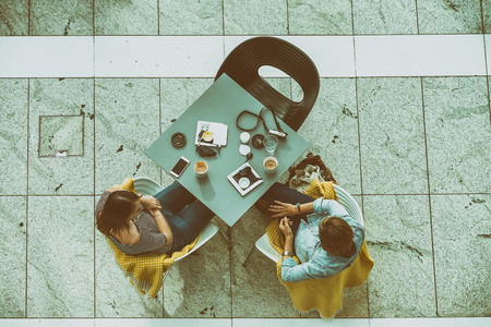 Young couple relaxing outdoor, overhead view. Tourism concept.の写真素材