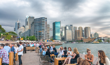 SYDNEY - NOVEMBER 6, 2015: Tourists and locals enjoy Harbour view. Sydney attracts 20 million people annually.のeditorial素材