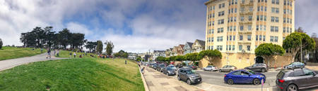 SAN FRANCISCO - AUGUST 5, 2017: Tourists enjoy Painted Ladies view. The city attracts 25 million people annually.のeditorial素材