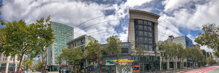 SAN FRANCISCO - AUGUST 5, 2017: City buildings from Market Street. The city attracts 25 million...