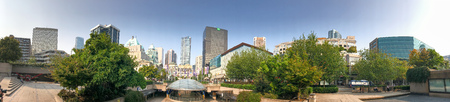 VANCOUVER, CANADA - AUGUST 10, 2017: Panoramic view of Robson Square skyline. Vancouver attracts 20...