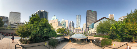 VANCOUVER, CANADA - AUGUST 10, 2017: Panoramic view of Robson Square skyline. Vancouver attracts 20 million people annually.のeditorial素材
