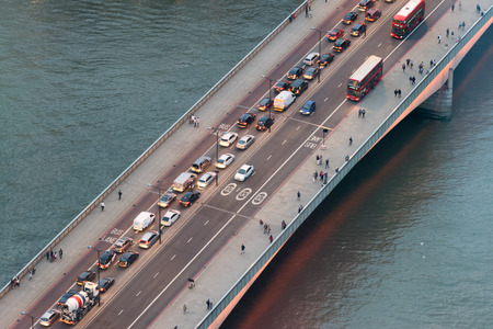 London city traffic on a bridge at night, aerial overhead view.のeditorial素材