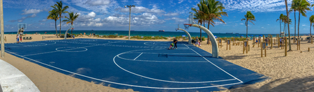 FORT LAUDERDALE, FL - FEBRUARY 29, 2016: Tourists and locals enjoy the promenade along the sea. Fort Lauderdale is a famous tourist attraction in Florida.のeditorial素材