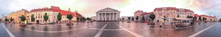 VILNIUS, LITHUANIA - JULY 9, 2017: Panoramic view of city square at sunset. Vilnius attracts 5 million visitors annually.の写真素材
