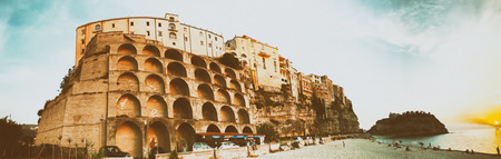 Tropea cityscape from the beach at summer sunset, panoramic viewの写真素材