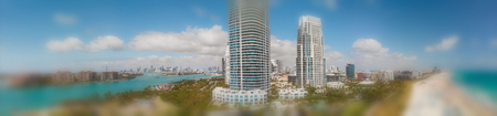 Panoramic aerial view of Miami Beach and South Pointe Park at dusk.