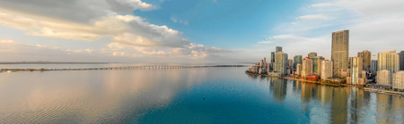 Panoramic aerial view of Miami and ocean at sunrise.の写真素材