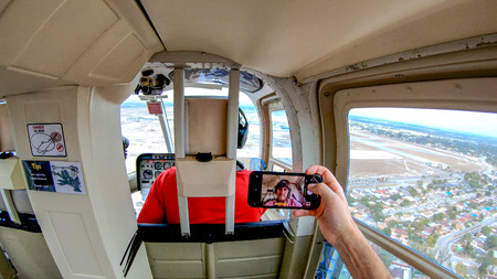 Making selfie inside a helicopter.