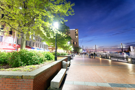 SAVANNAH, GA - APRIL 2, 2018: Tourists enjoy city streets at night. Savannah hosts 15 million tourists annually.のeditorial素材