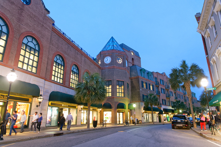 CHARLESTON, SC - APRIL 5, 2018: Tourists enjoy city center at night. Charleston is a famous tourist attraction in South Carolina.のeditorial素材