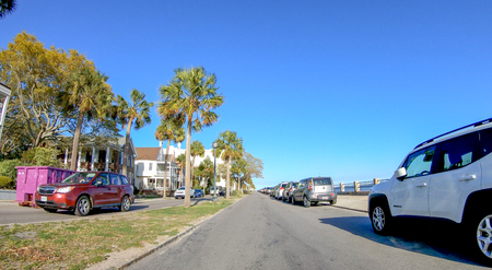 CHARLESTON, SC - APRIL 7, 2018: City oceanfront with tourists on a sunny day. The city attracts 10 million tourists annually.のeditorial素材