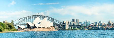 SYDNEY - OCTOBER 23, 2015: Beautiful panoramic view of city harbour. Sydney attracts 10 million visitors around the globe annually.のeditorial素材